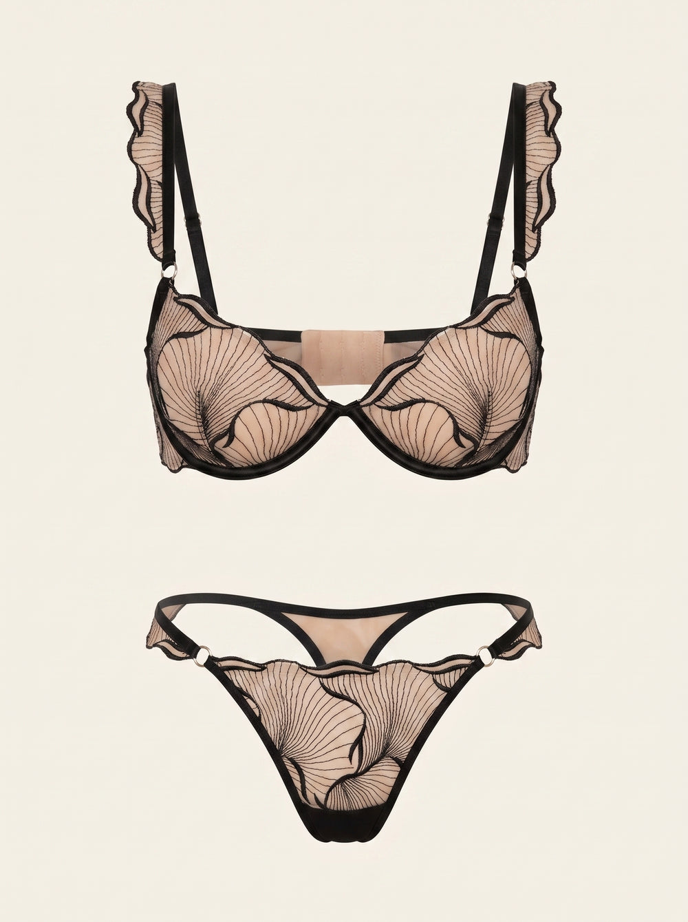 Set di lingerie in rete nera con ricami floreali e dettaglio a fiocco