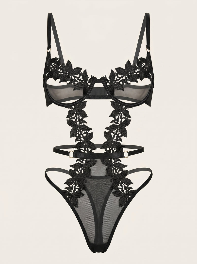 Body in pizzo mesh nero con design a intagli e stringhe