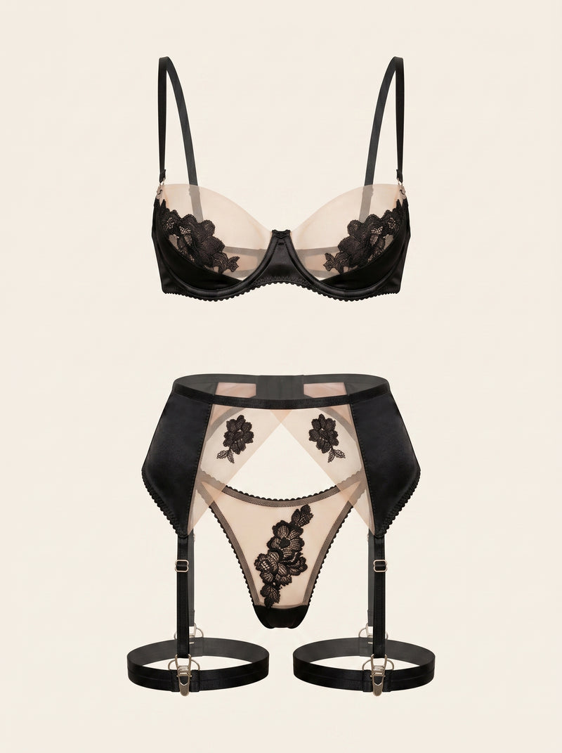 Set di lingerie in rete di pizzo nero con dettagli floreali