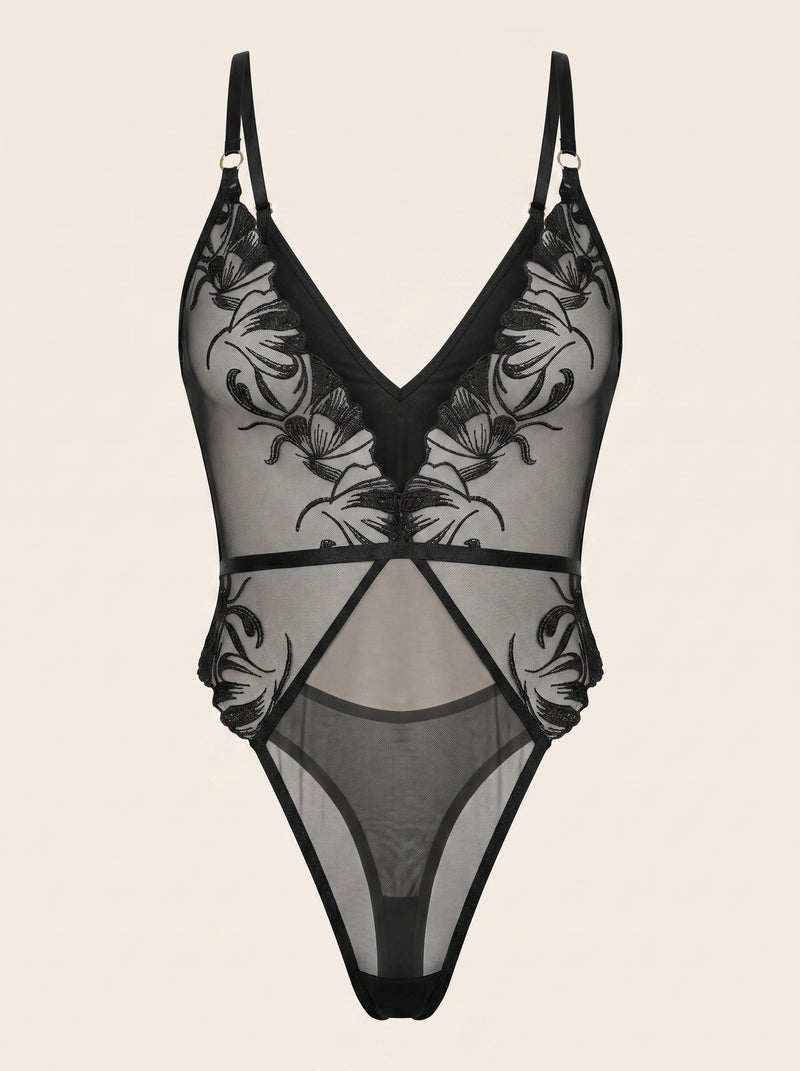 Body nero in rete trasparente con aperture