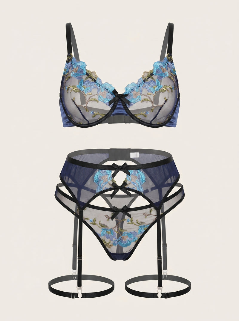 Completo di lingerie in pizzo blu floreale ricamato con reggicalze e dettagli a spalline incrociate