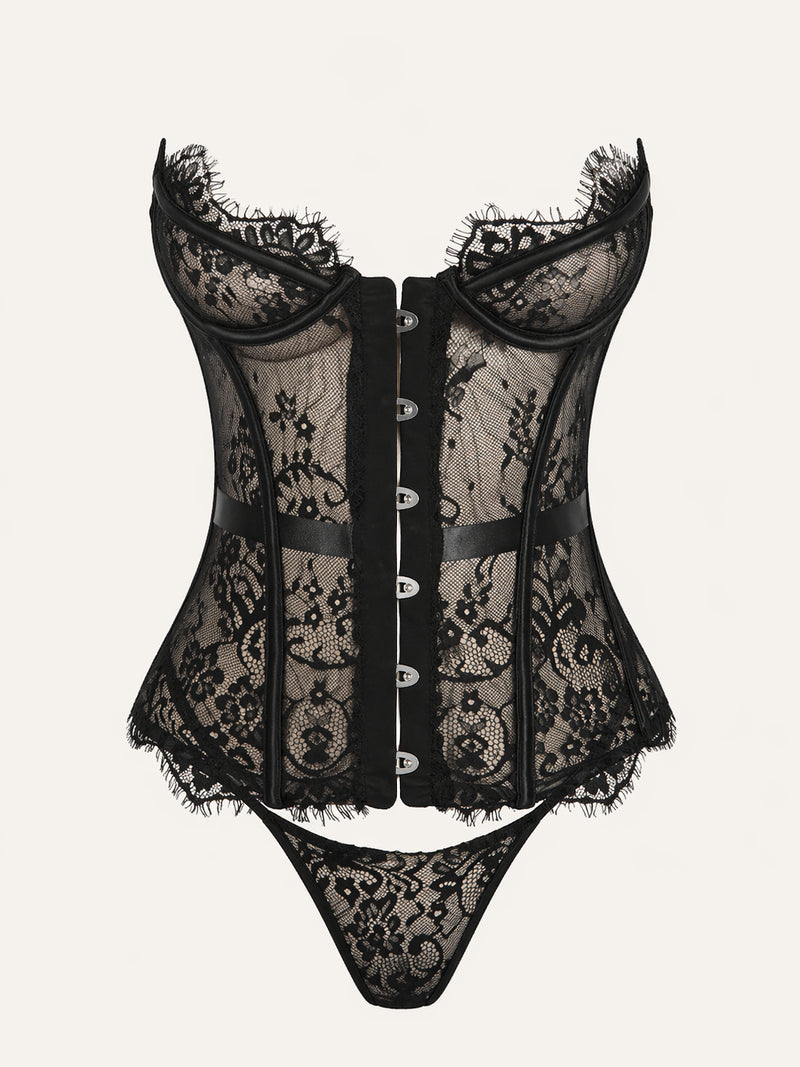 Completo reggiseno corsetto in pizzo nero con spalline e dettagli con frange